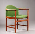 Dansk møbelproducent. Armstol af teaktræ.