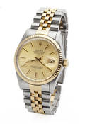 Rolex Datejust. Herrearmbåndsur i 18 kt. guld og stål, 1984