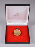 Zenith, ovalt fickur i 18k guld.