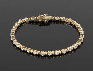 Brillantarmbånd af forgyldt hvidguld 18 kt. 