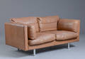 Dansk møbelproducent. Topersoners sofa af brunt læder 