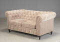 Sofa i chesterfield stil.