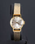 Omega dameur med lænke af 14 kt