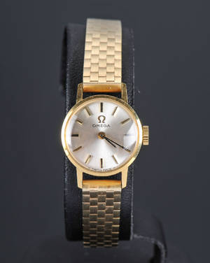Omega dameur med lænke af 14 kt