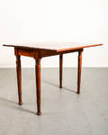 Spelbord i mahogny, 1900-talets första del