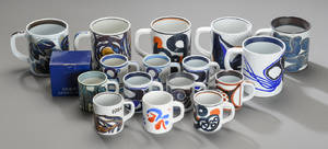 En samling årskrus fra Aluminia samt Kgl. Porcelæn 16