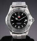 Tag Heuer Professional. Herreur i stål med sort skive med dato, 2000erne Denne vare er sat til omsalg under nyt varenummer 4596684