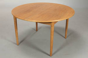 Cirkulært spisebord med udtrækmagasin