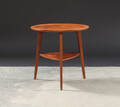 Dansk møbelproducent. Cirkulært sidebord af teak