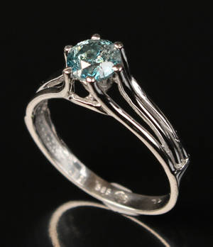 Solitairering af rhodineret guld med brillant ca. 0.88 ct