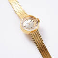 Omega damarmbandsur i 18 k guld