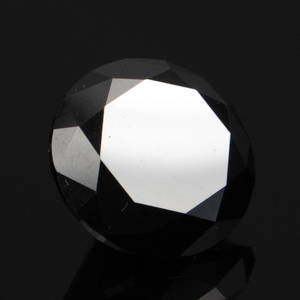 Uindfattet behandlet sort diamant ca. 21.55 ct. 