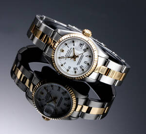 Rolex Datejust. Dameur i 18 kt. guld og stål med hvid skive, ca. 1986