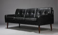 Tre-pers. sofa, sort skind, dansk møbelproducent