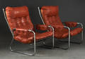 Ett par fåtöljer i skinn och kromat stål 1970-tal 2