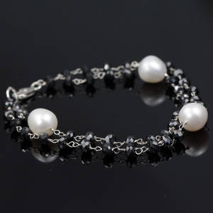 Perle og diamant armbånd.
