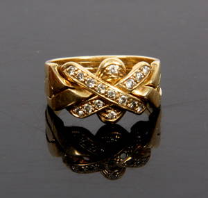 Samlering i 18 kt guld m. brillanter.