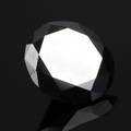 Uindfattet behandlet sort diamant  ca. 6.42 ct.