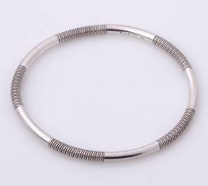 Georg Jensen. Armring af sterlingsølv med snoet mønster, før 1945