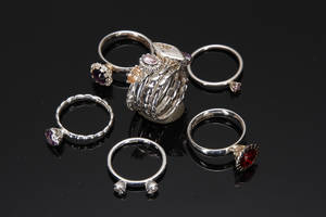 Spinning Jewelry, ni ringe i sterlingsølv. 9