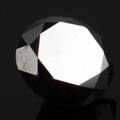 Uindfattet behandlet sort diamant ca 1.65 ct.