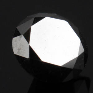 Uindfattet behandlet sort diamant ca 1.65 ct.