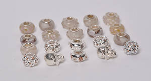 Charlotte Borgen, 20 charms - brun og gylden farve komb. 20