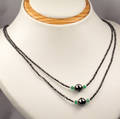 Smaragd og diamant collier.