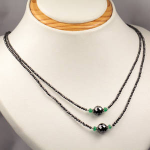 Smaragd og diamant collier.