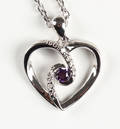 Vedhæng af sterlingsølv med diamanter og synt. amethyst 