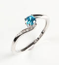 Ring af sterlingsølv med diamanter og synt. topaz