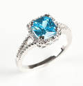 Ring af sterlingsølv med diamanter og synt. topaz