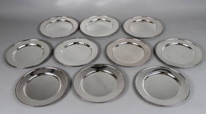 Sæt på ti ens dækketallerkner af sølvplet 19