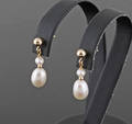 Gold fresh water pearl earrings. 2.