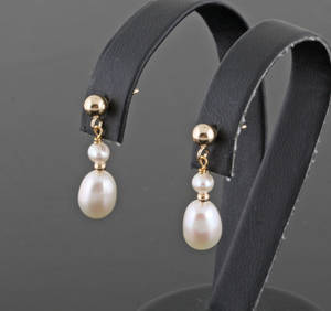 Gold fresh water pearl earrings. 2.