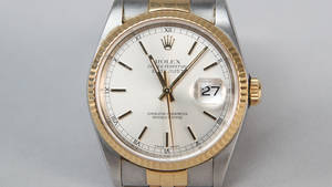 Rolex Oyster Perpetual Datejust. Herrearmbåndsur af stål og guld