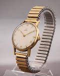 Omega. Vintage herreur i kasse af 14kt. guld, ca. 1947