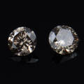 Uindfattet brillanter 0.06 ct og 0.07 ct.