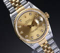 Rolex Datejust. Herreur i 18 kt. guld og stål med brillantbesat skive, ca. 1990