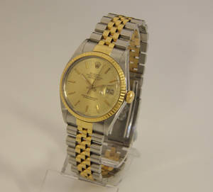 Rolex Datejust. Herreur af 18 kt. guld og stål, ca. 1986