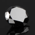 Uindfattet behandlet sort diamant ca 1.55 ct.