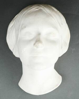 Kvindeansigt i gipsstøbning.