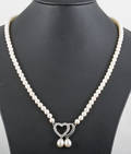 Cultured fresh water pearls necklace with cubic zirconia pendant