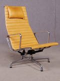 Charles  Ray Eames, fåtölj EA 124, cognacsfärgat läder