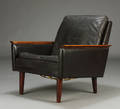Dansk møbelproducent. Lænestol, riopalisanderbrunt skind