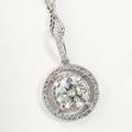 Halskæde med diamantvedhæng af 18 kt. hvidguld prydet med brillantslebet diamant på ca. 1.50 omkranset af talrige brillantslebne diamanter. Justerbar. Ca. 2012.