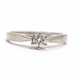Diamantring af 14 kt. hvidguld prydet med brillantslebet diamant på 0.25 ct. Str. 53.