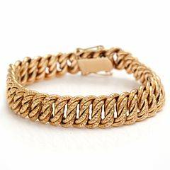 Armbånd af 14 kt. guld. L. ca. 19,5 cm. Vægt ca. 37,5 gram. Ca. 1950-1960.
