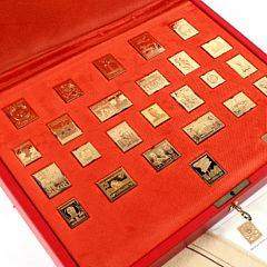 PAX DANICA. Komplet samling i original-æske med alle 25 frimærker i forgyldt sølv.