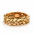 Armbånd af 18 kt. guld. L. ca. 19 cm. Vægt ca. 53 gr. Ca. 1960.